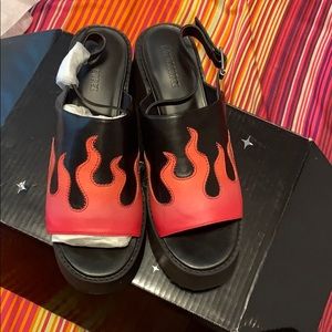 Horoscopez Dolls kills .. hot as hell Sandler!